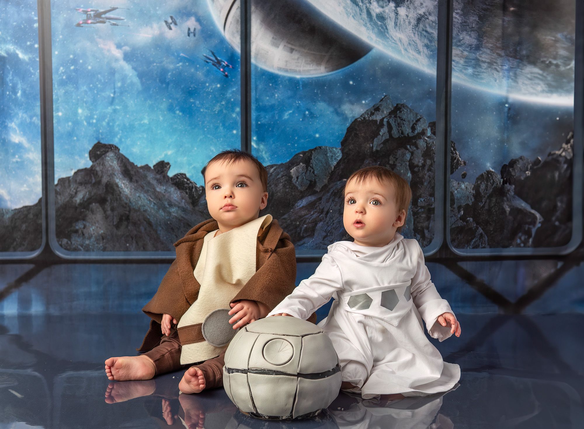 Twin Photo Shoot Star Wars Cake Smash Twin boy and girl with Star Wars cake in front of a Star Wars background