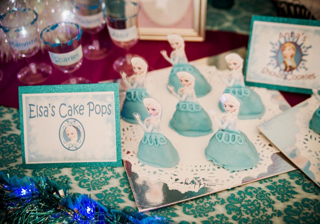 Cake pops decorate to look like Elsa from the movie Frozen