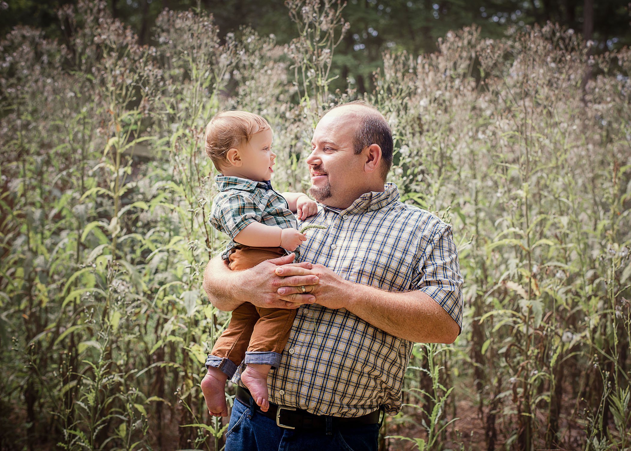 9 mo old baby boy and Daddy standing in a field of weeds One Big Happy Photo