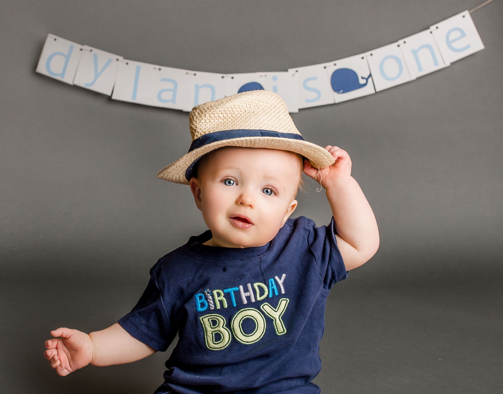 one year old baby with birthday shirt and hat on One Big Happy Photo