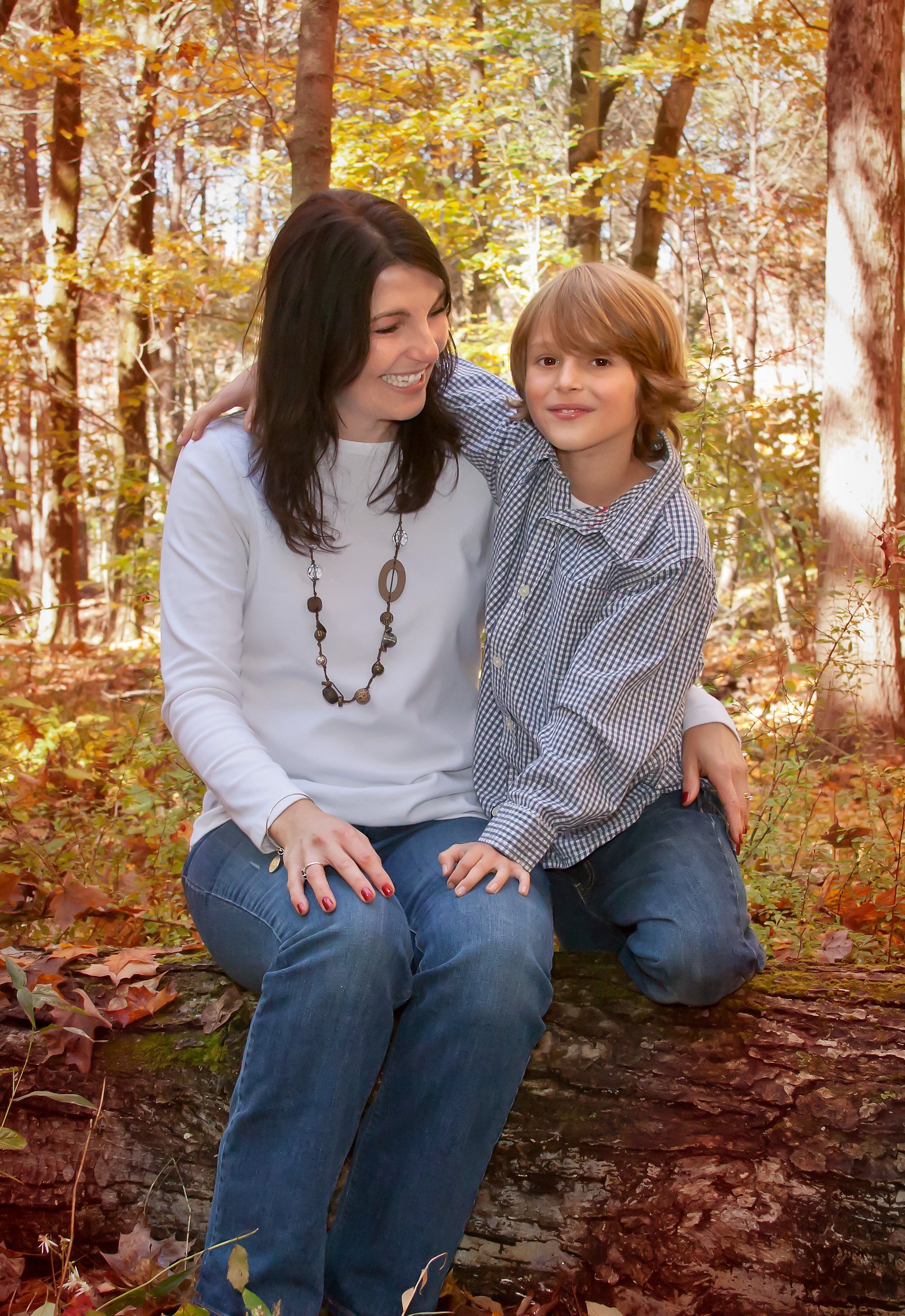Mom and son in the fall woods