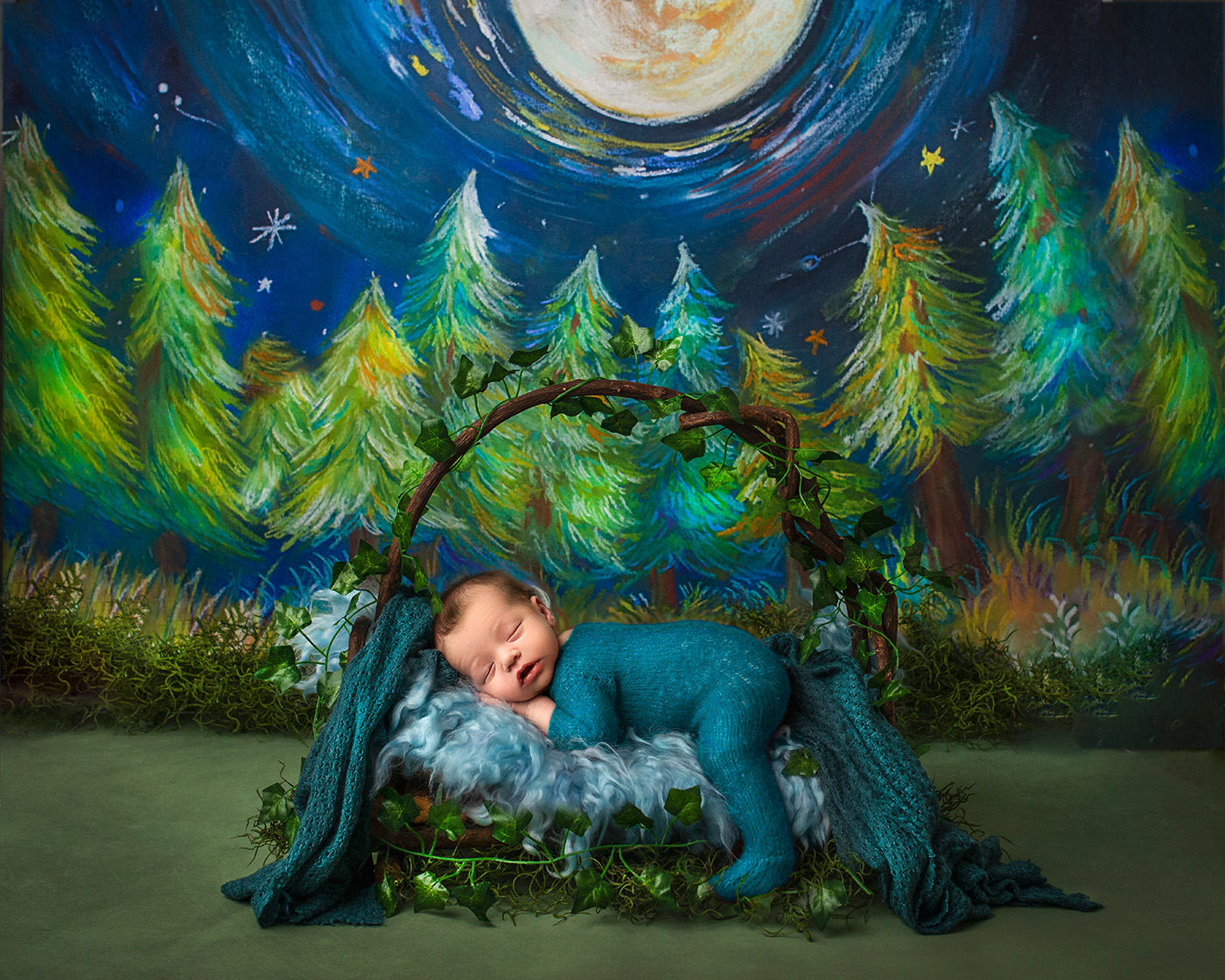 Newborn Photography Shoot baby sleeping on a rustic bed in front of evergreens and the moon