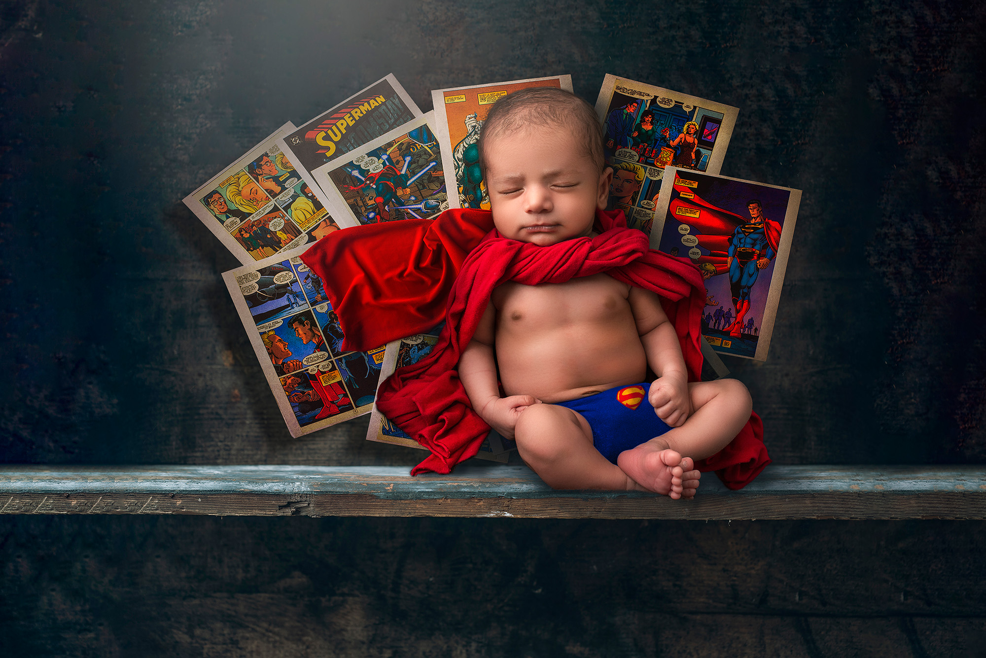 best time for newborn photoshoot newborn boy posed as superman