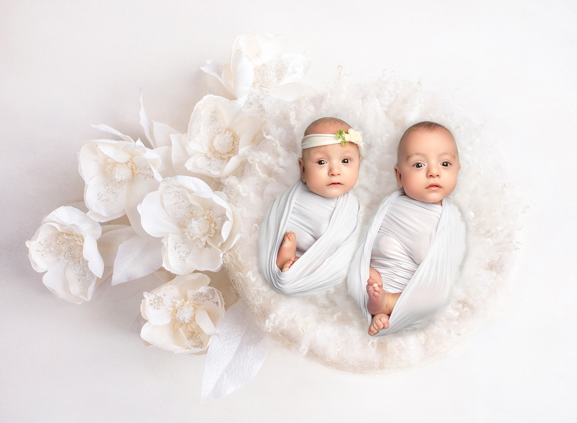 best time for a newborn shoot twin babies wrapped in white