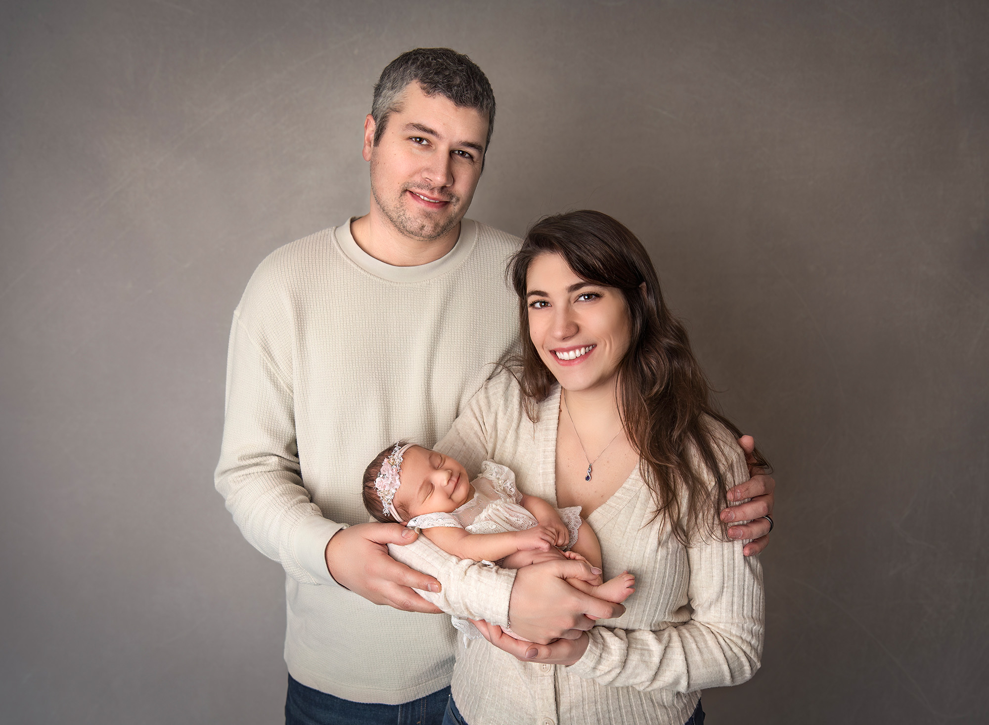 professional newborn photography mom, dad and newborn baby girl family photograph