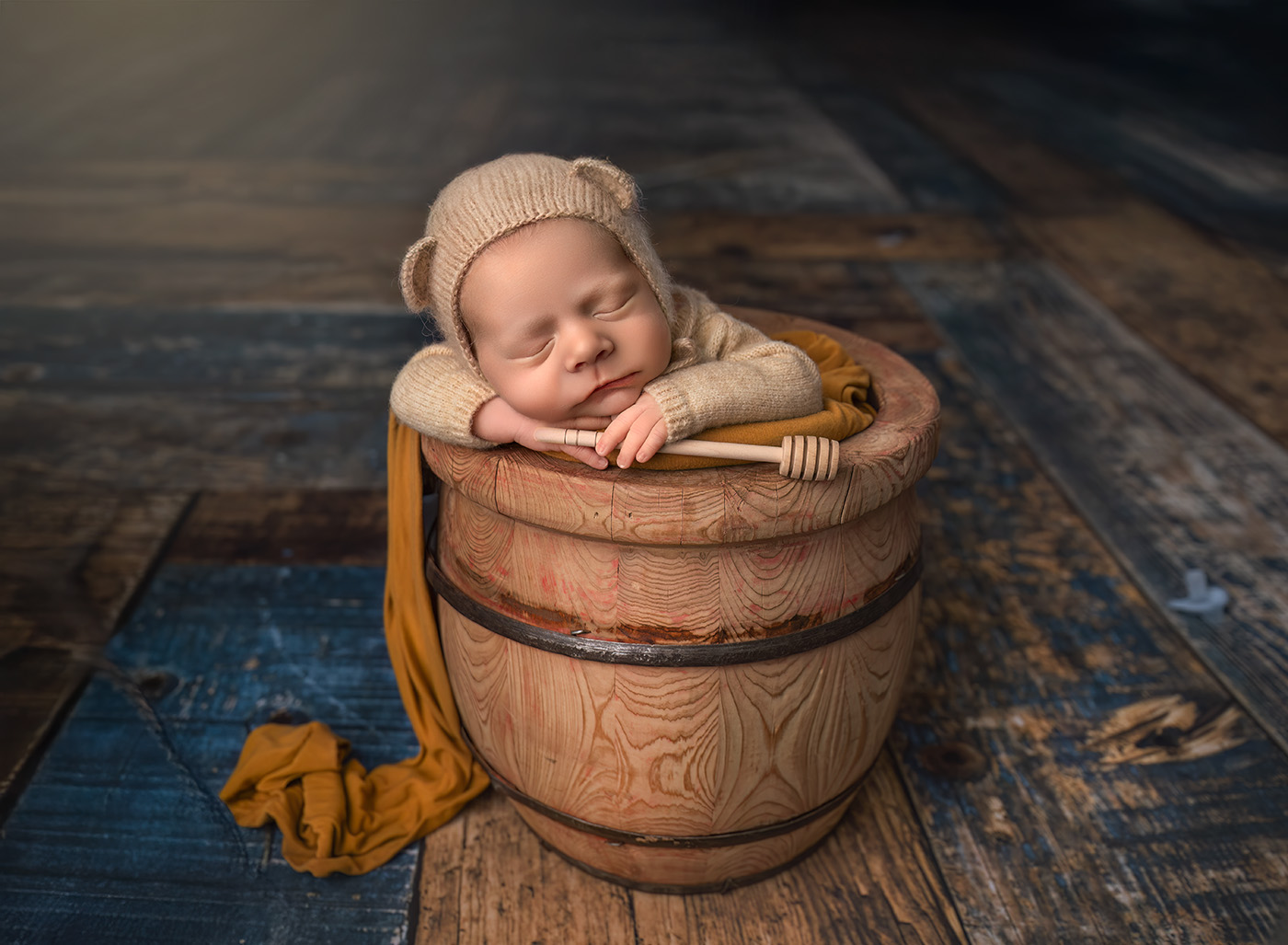 newborn photos with teddy bears Newborn baby Teddy asleep in a honey bucket holding a honey spoon
