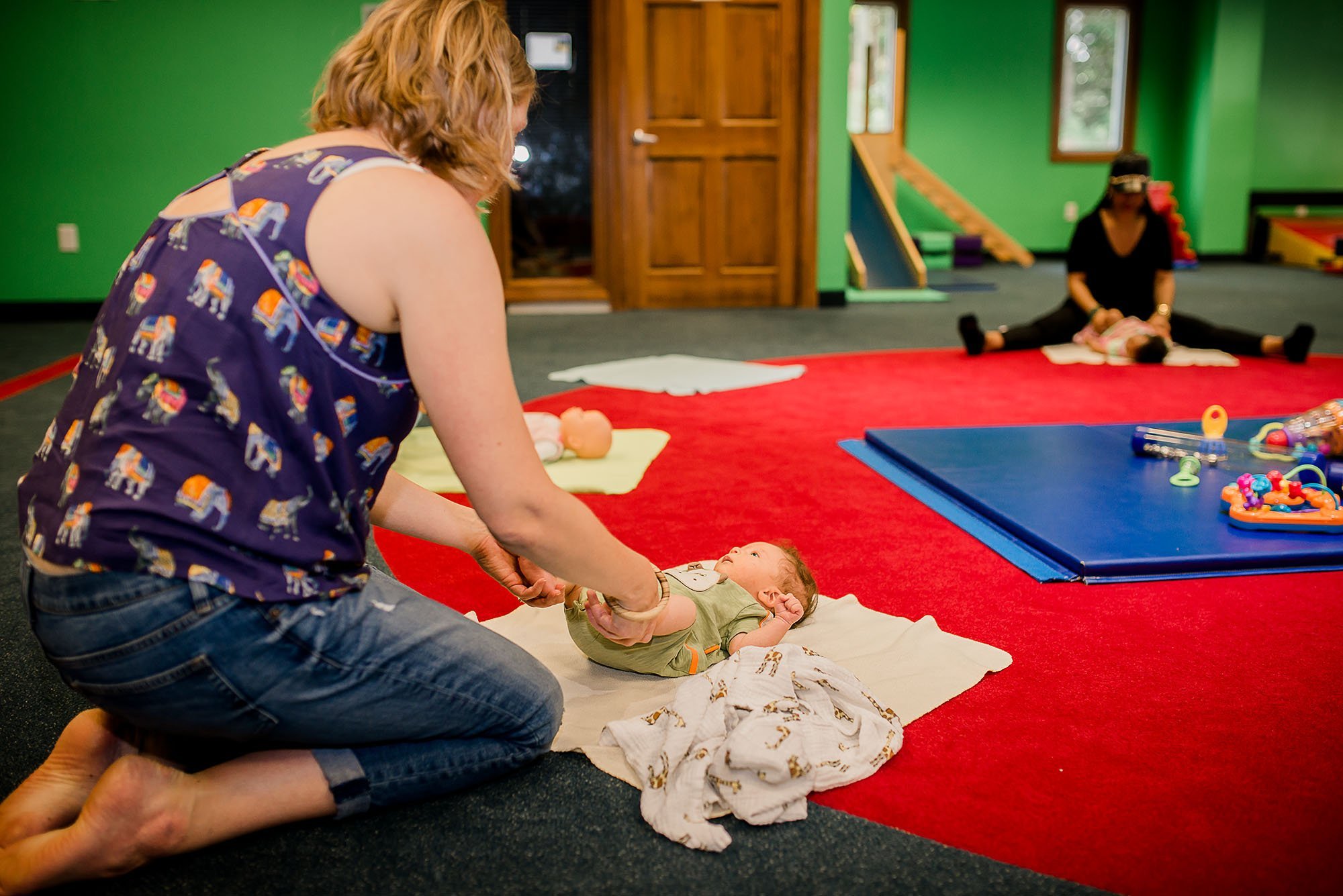 Mom playing with baby during song time at My Gym Glastonbury