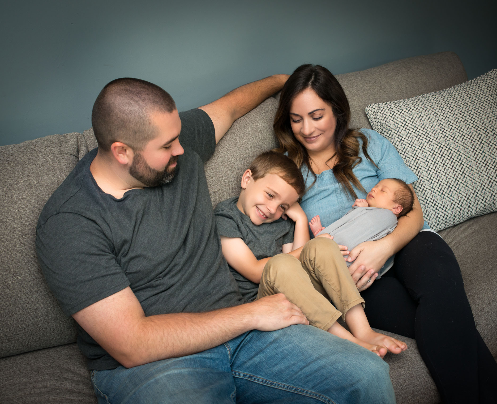 lifestyle family portrait with 5 year old and newborn baby brothers