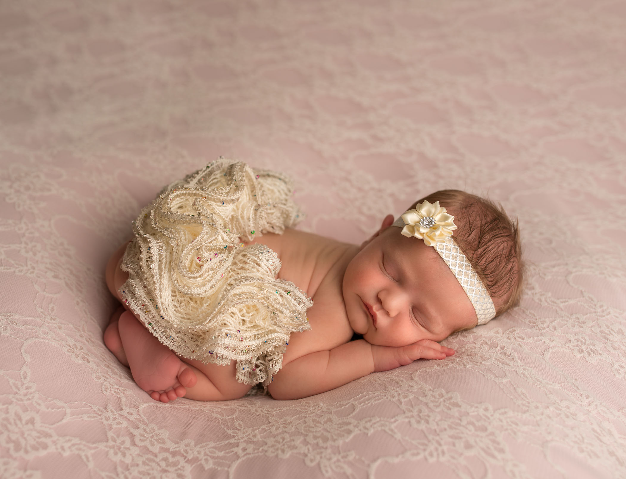 newborn baby girl with ruffled tutu