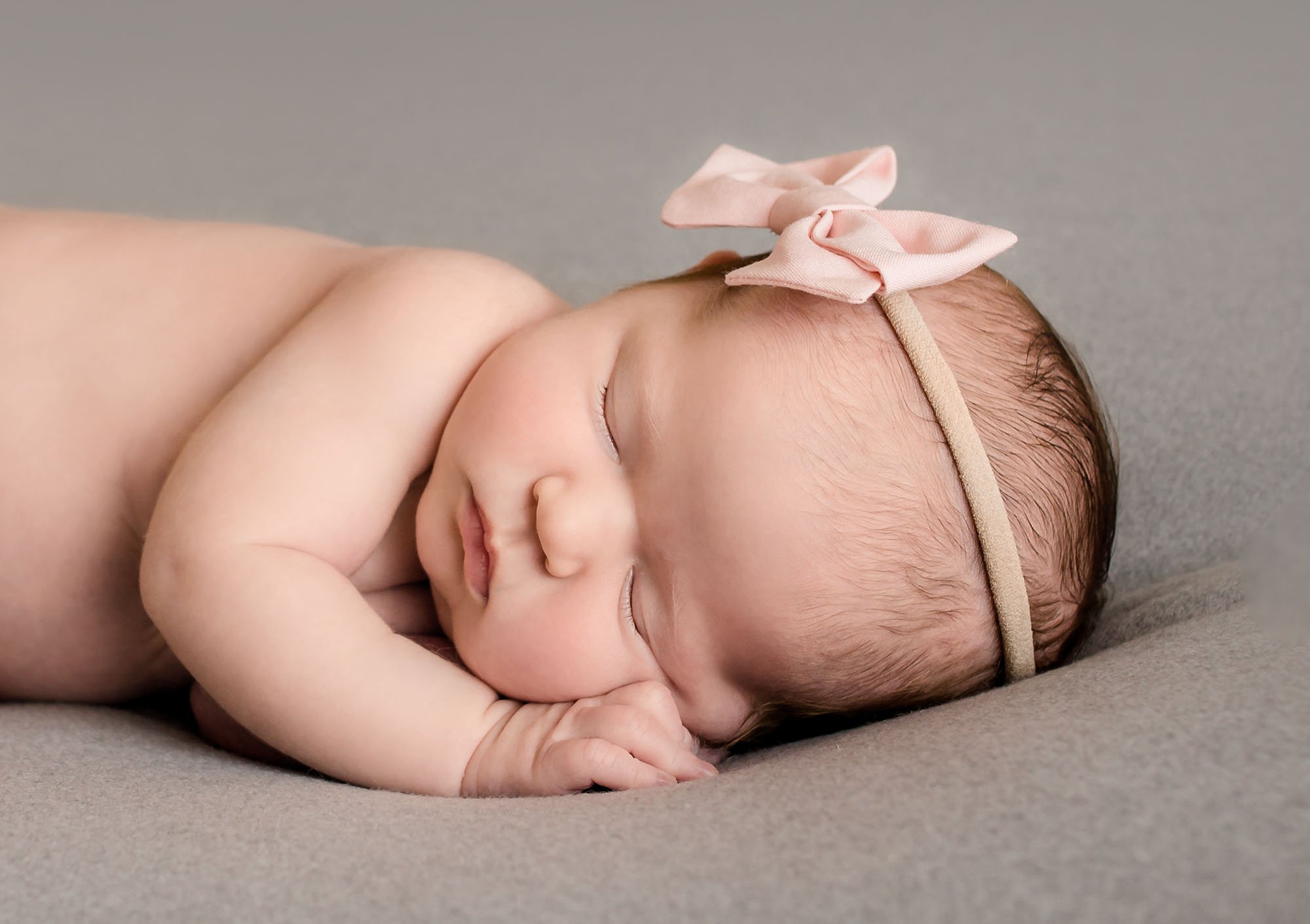 newborn baby girl with pink box One Big Happy Photo