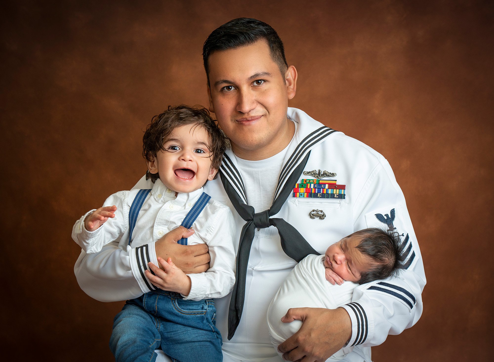 hispanic family with baby